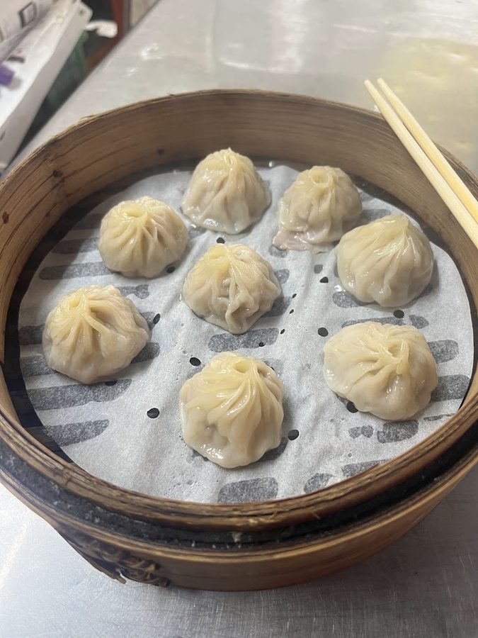 a qi shi xiao long bao soupy bun